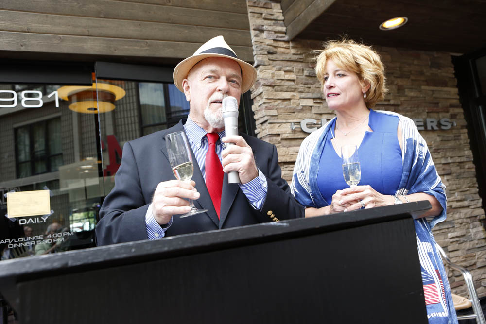 Rex and MaryBeth Chandler toast to 10 years.