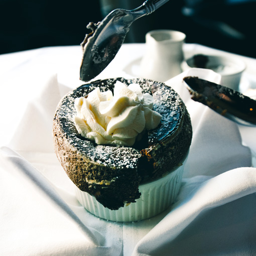 Grand Marnier whipped cream on Chandlers chocolate souffle